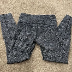 Lululemon 26” inseam and un-hemmed.  Size 4. Black/white patterned